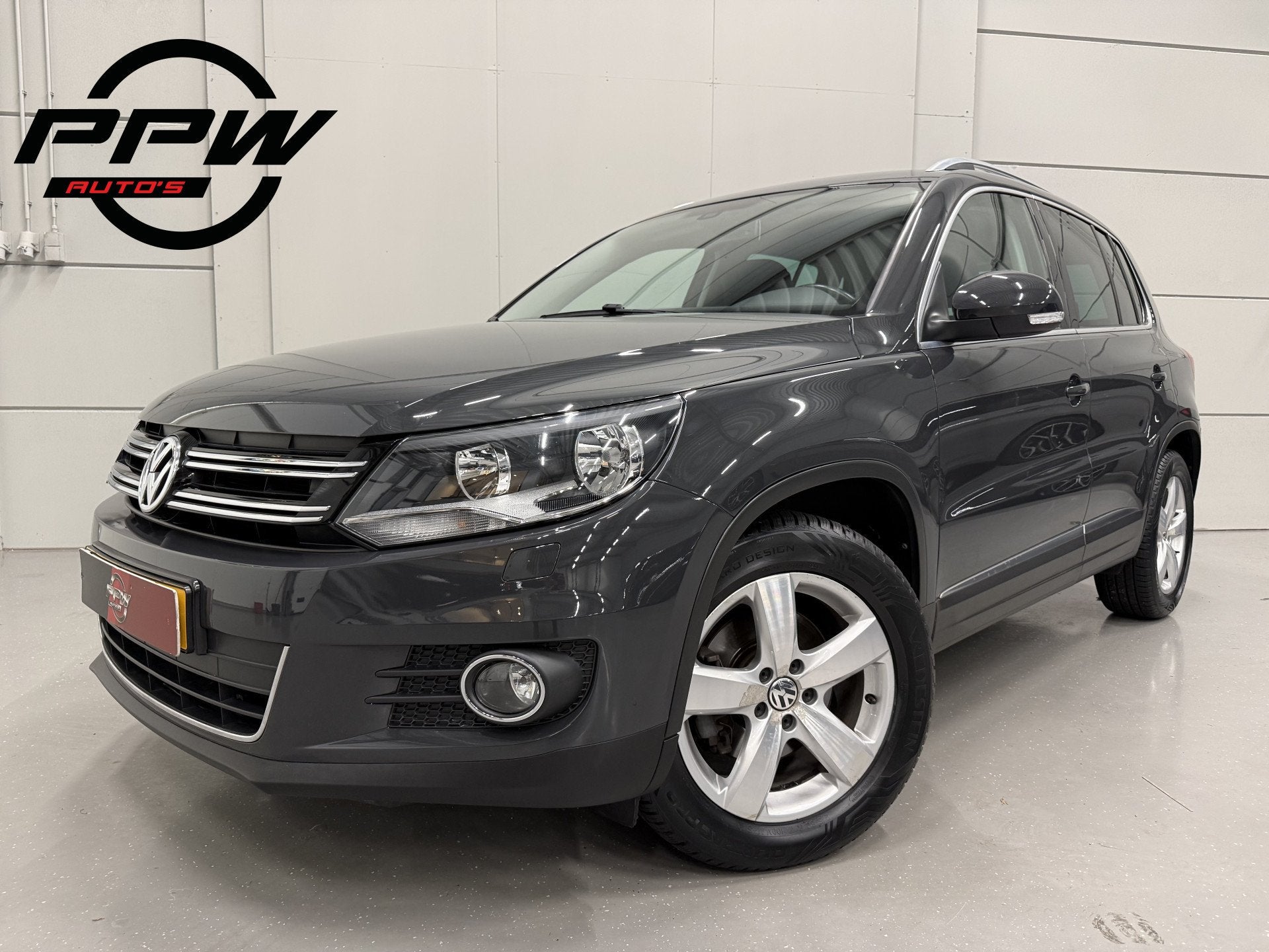 Volkswagen Tiguan 1.4 TSI 150PK Sport&Style aut. TREKHAAK/NA, Dealer onderhouden, 4 cilinders, 1405 kg, Verwarmde buitenspiegels