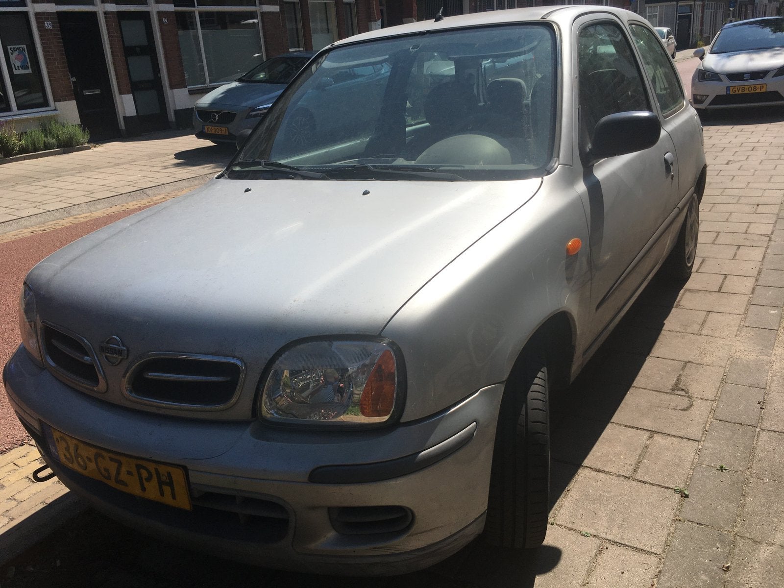 Nissan Micra 1.0 Automaat Grijs lage km. stand, Auto's, Voorwielaandrijving, 4 cilinders, 450 kg, Origineel Nederlands