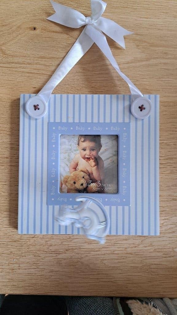 Baby Blauw Fotolijstje, Audio, Tv en Foto, Fotografie | Fotolijsten, Gebruikt, Standaard fotolijst, Ophalen of Verzenden, Overige materialen