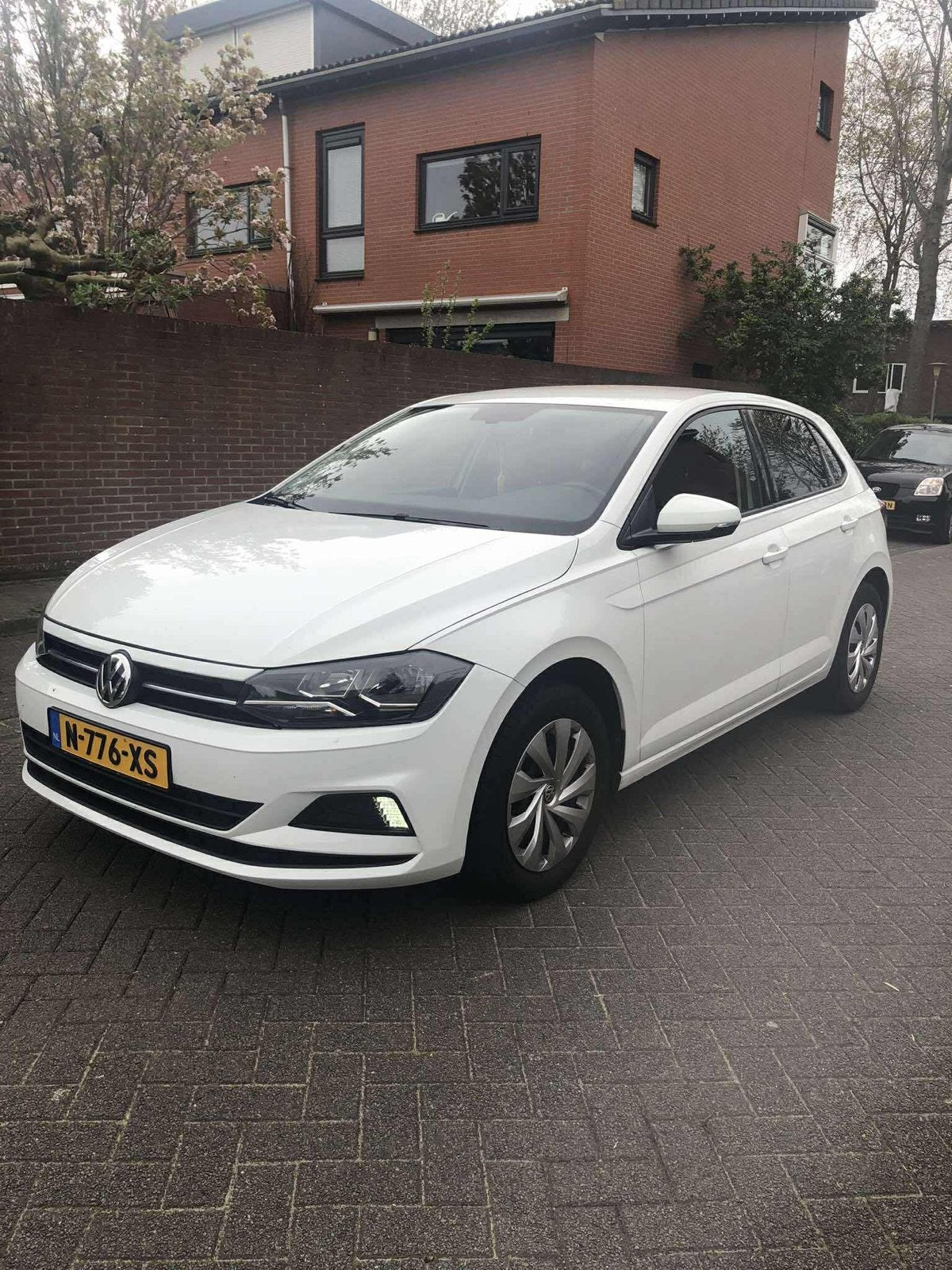 Volkswagen Polo 1.0 TSI 95pk 2018 Wit, Auto's, Voorwielaandrijving, Stof, 40 €/maand, Zwart