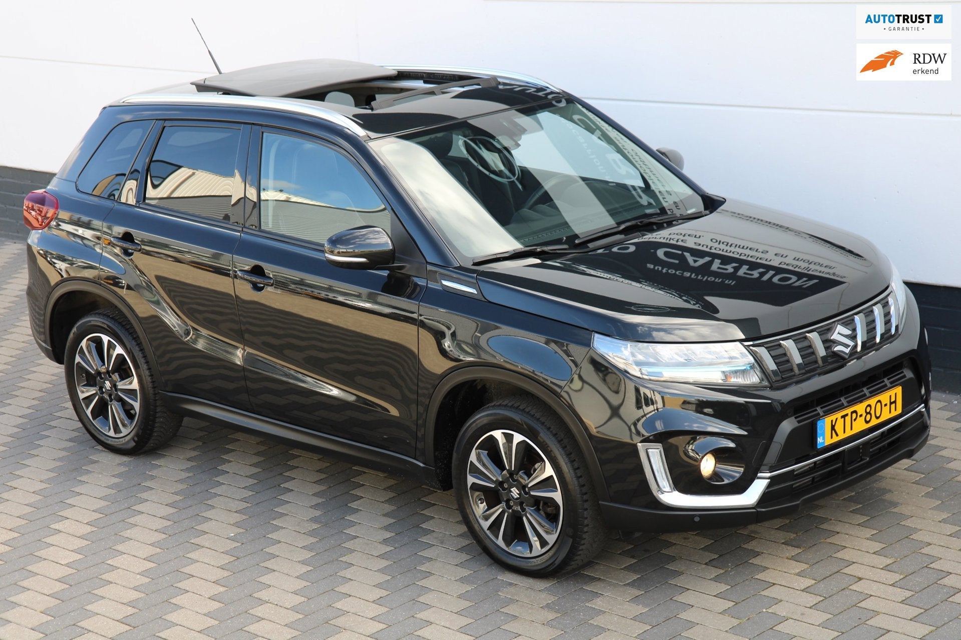 Suzuki Vitara 1.4 Boosterjet Style Smart Hybrid Pano Carplay, Auto's, Dealer onderhouden, Gebruikt, Zwart, 4 cilinders