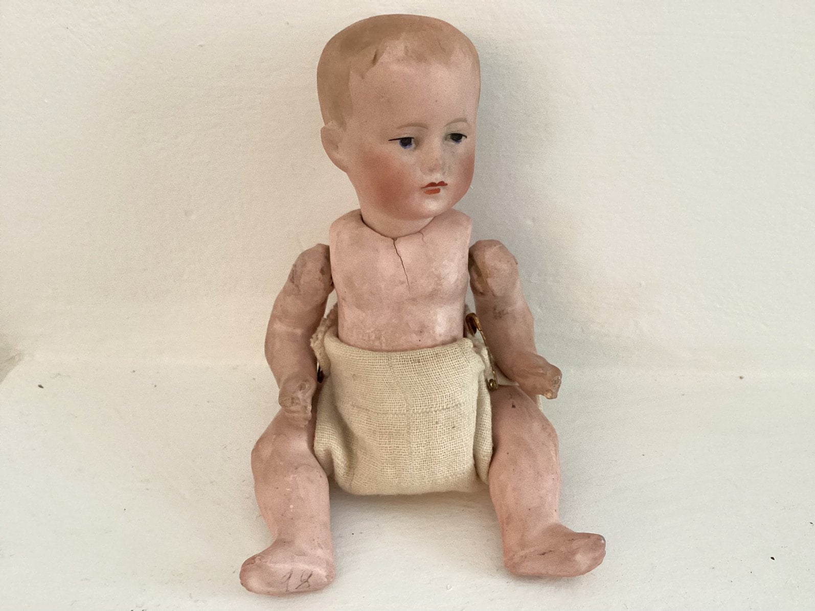 Popje genummerd met hoofd porselein, Antiek en Kunst, Antiek | Speelgoed, Ophalen of Verzenden