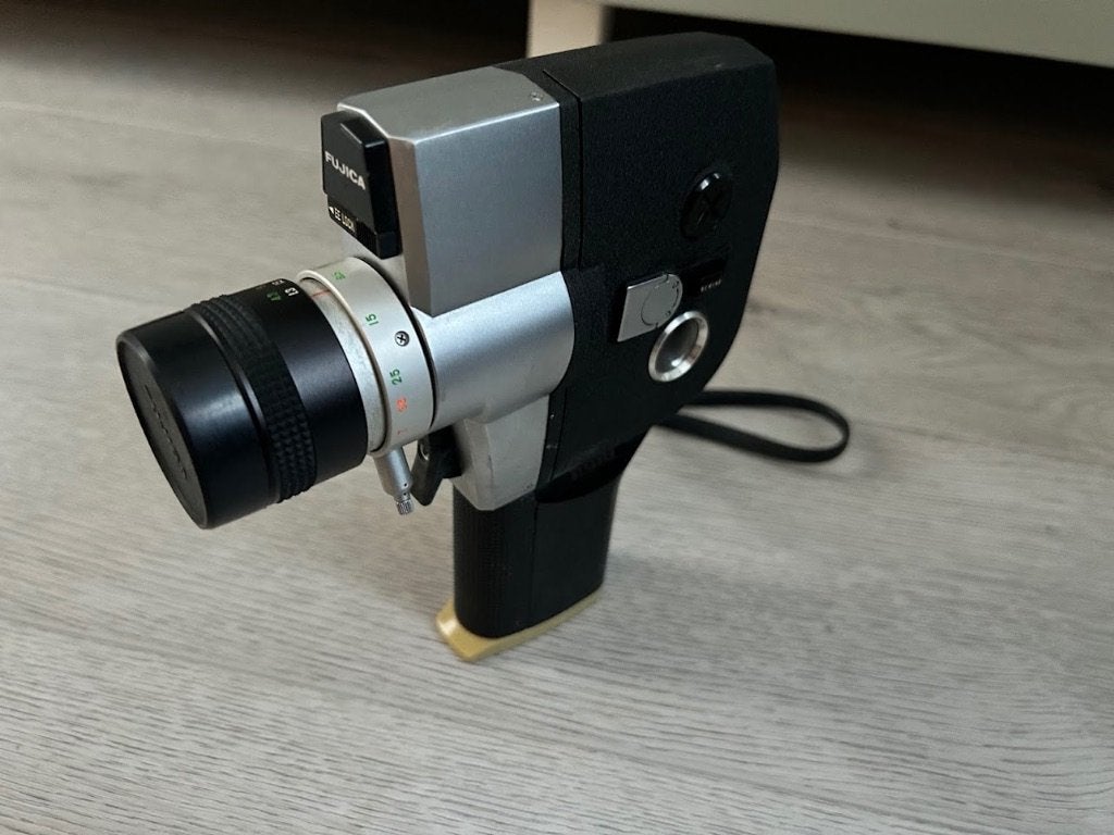 Fujica Single-8 P400 filmcamera met origineel leren tasje, Ophalen of Verzenden, Hi 8, (Video)band