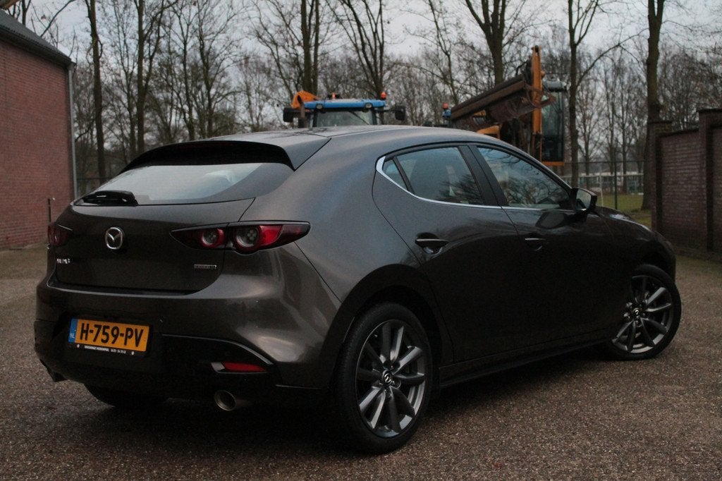 Mazda 3 2.0 e-SkyActiv-X M Hybrid 180 Comfort | HUD | Bose |, Auto's, Voorwielaandrijving, Stof, Gebruikt, 4 cilinders