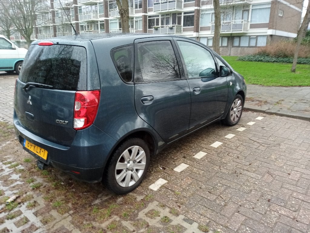 Mitsubishi Colt 1.3 5-DR AUT 2010 Grijs, Stof, 31 €/maand, Colt, Origineel Nederlands