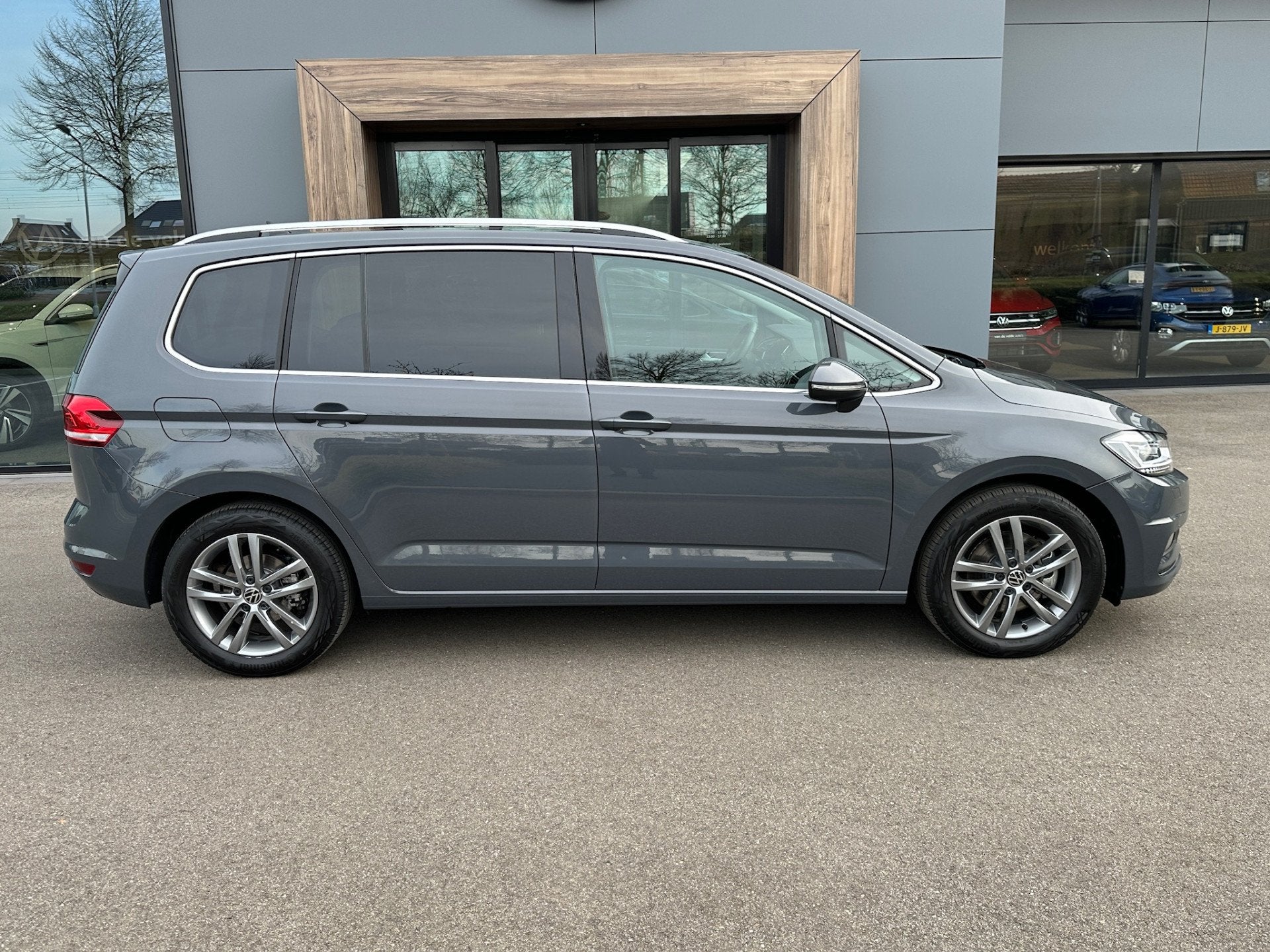Volkswagen Touran 1.5 TSI 150pk DSG Highline 7-persoons | Do, Auto's, 12 maanden, 15 km/l, Zwart, 4 cilinders