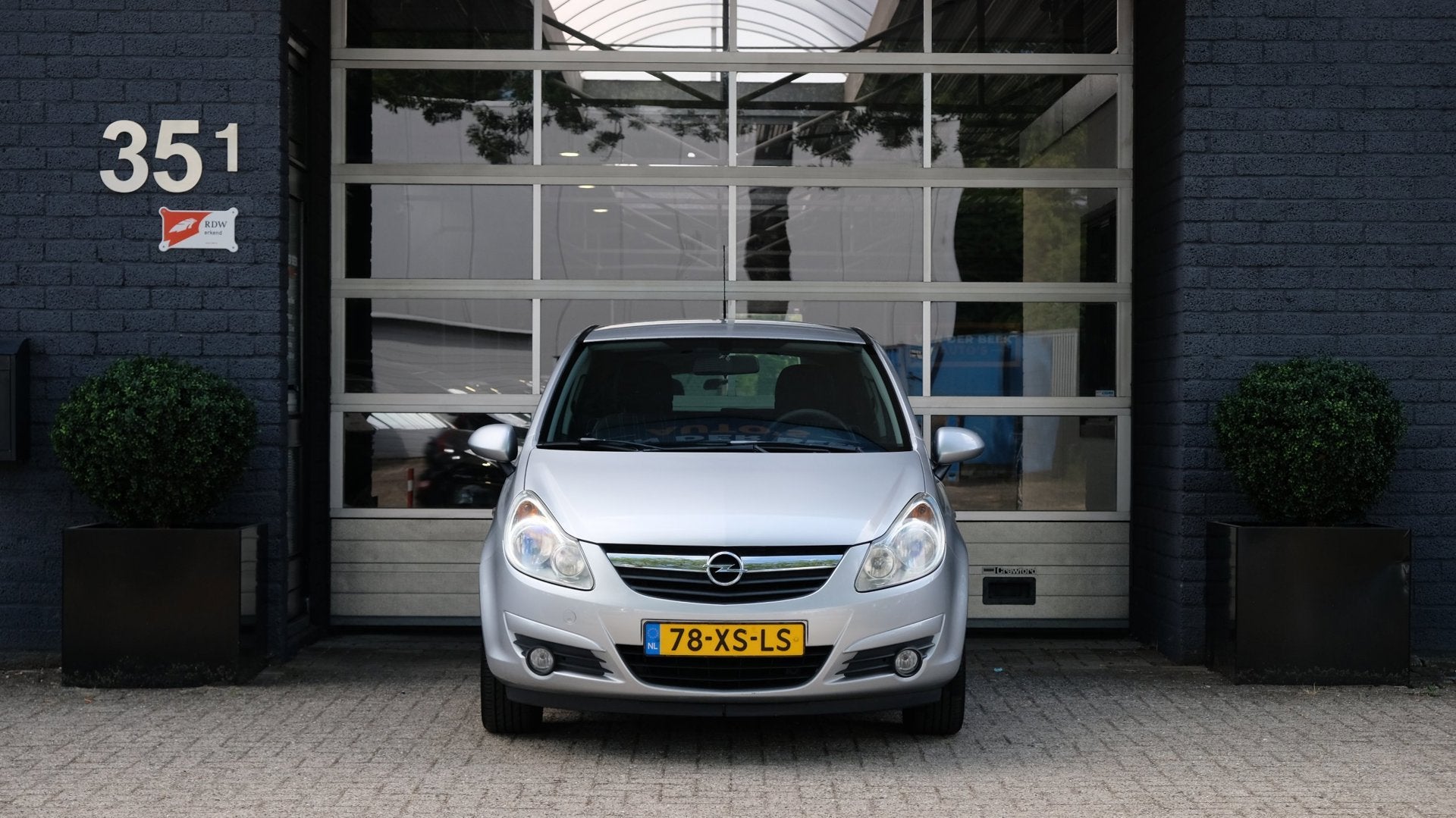 Opel Corsa 1.4-16V Enjoy, Auto's, Opel, Voorwielaandrijving, Stof, Gebruikt, Zwart