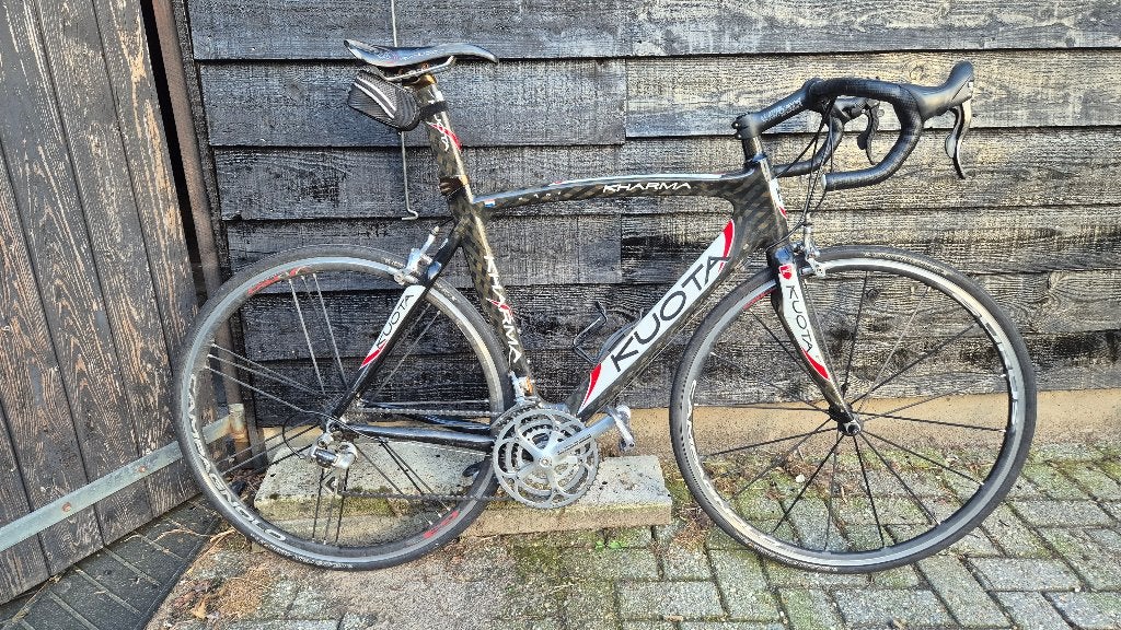 Kuota Kharma racefiets, Campognolo wielen en afmontage, 28 inch, Gebruikt, Carbon, Velgrem