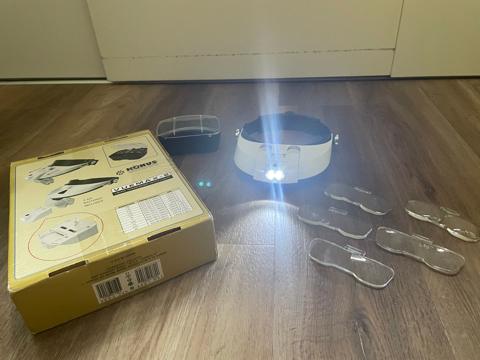 Hoofdbandloep met LED-verlichting en verwisselbare lenzen, Ophalen of Verzenden, Zo goed als nieuw, Loeplamp