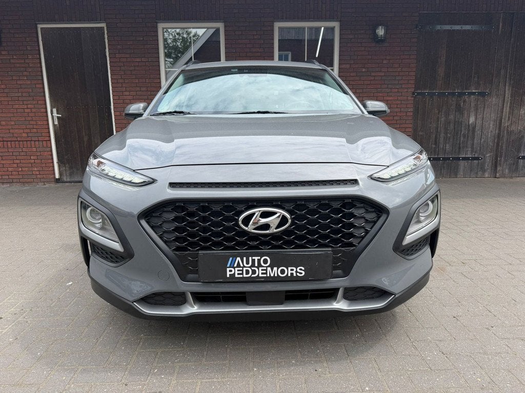 Hyundai Kona 1.6 GDI HEV Comfort | Carplay| Camera| Stoel en, Stof, Gebruikt, Zwart, Start-stop-systeem