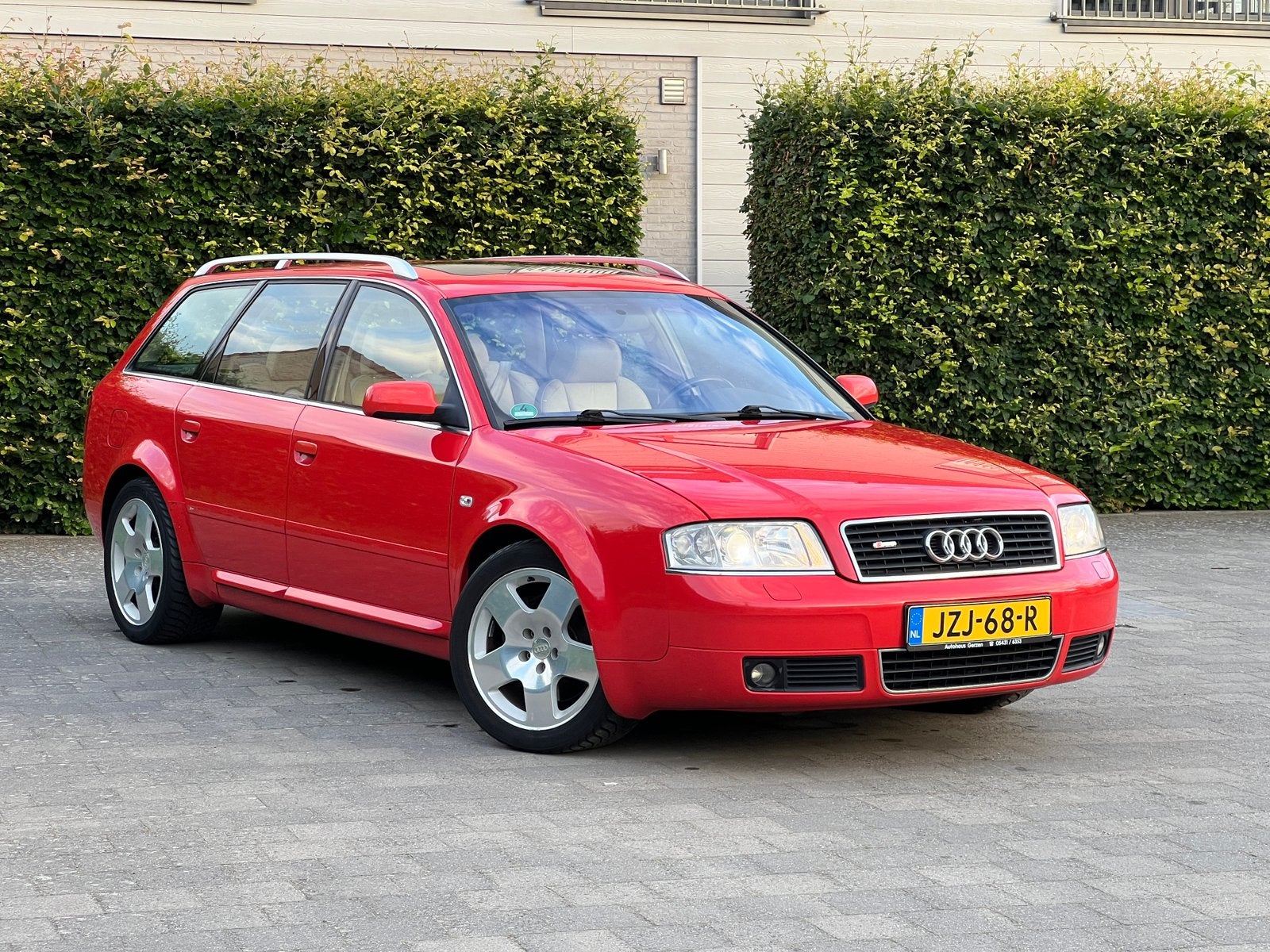 Audi A6 avant 4.2 V8 - Misano Rood - Audi Exclusive - Bomvol, Auto's, Audi, Particulier, A6, 4x4, ABS, Airbags, Airconditioning