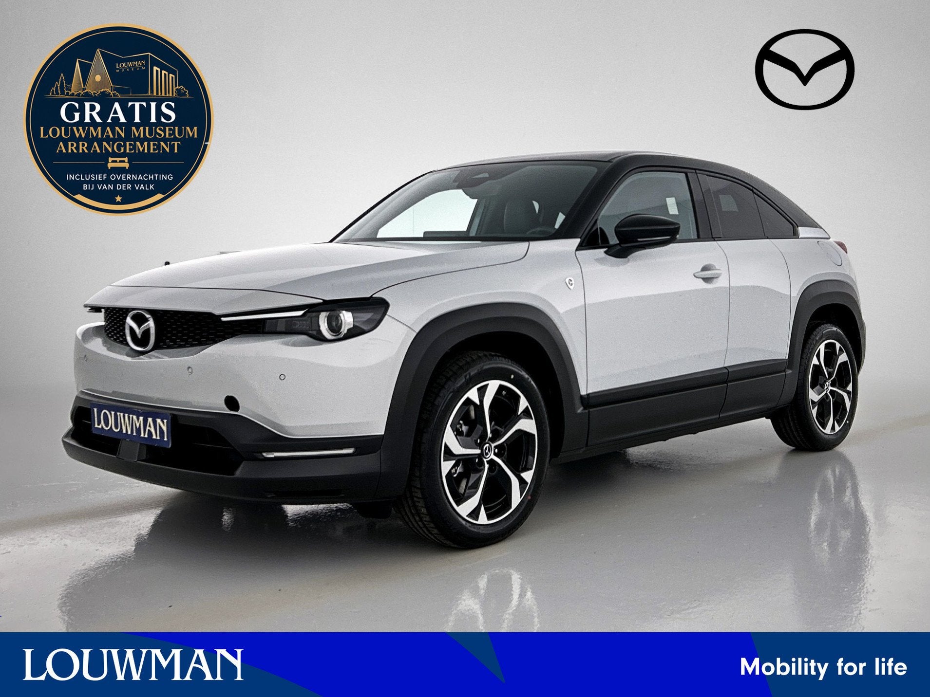 Mazda MX-30 e-SkyActiv R-EV 170 Exclusive-line Getoonde prij, Auto's, Mazda, 12 maanden, Zwart, Leder en Stof, Wit