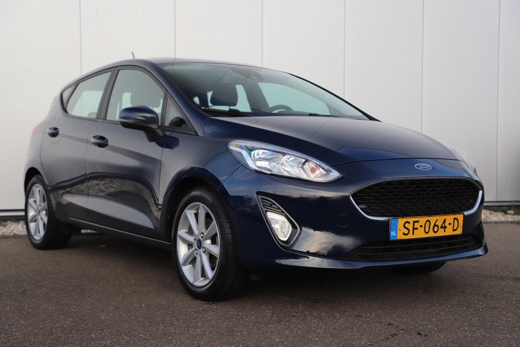 Ford Fiesta 1.1 Trend Trekhaak Navigatie 15 inch LMV Airco B, Voorwielaandrijving, Met garantie (alle), Blauw, Origineel Nederlands