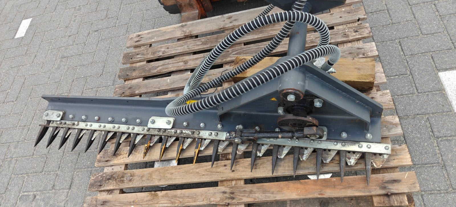 Hydraulische heggenschaar, Ophalen