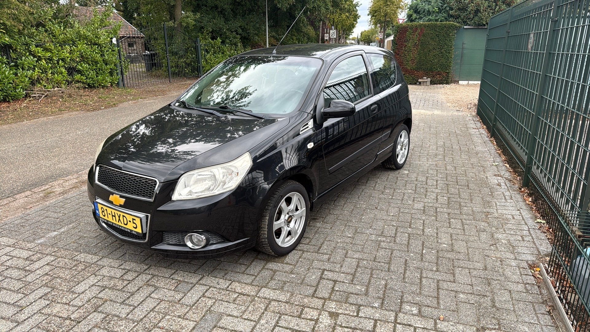 Chevrolet Aveo 1.2 16V 3D 2009 Zwart, Auto's, Voorwielaandrijving, Stof, 40 €/maand, Aveo
