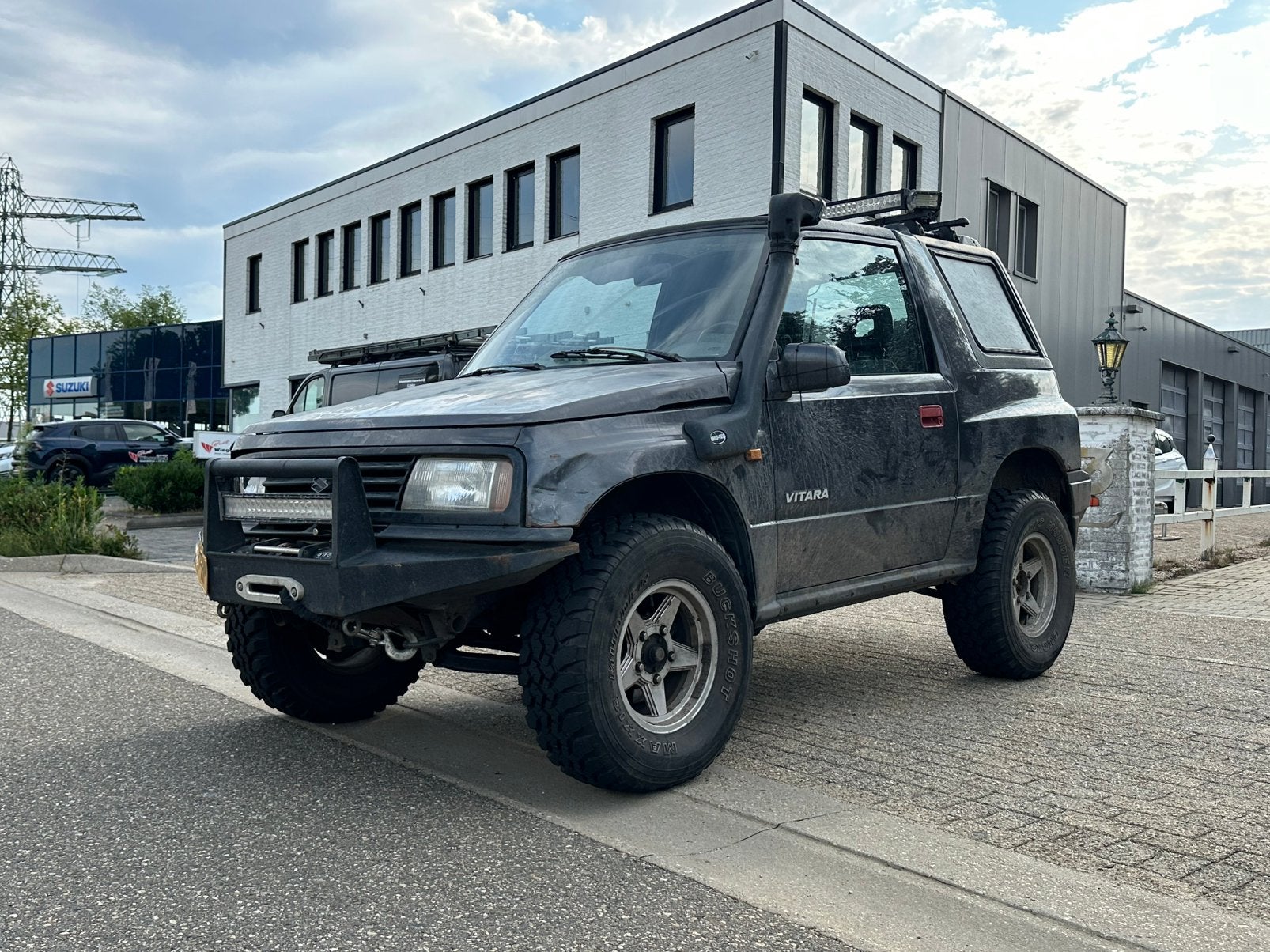 Suzuki Vitara 1.6 Comm JLX 4WD 1992, 1450 kg, Stof, 74 pk, Zwart