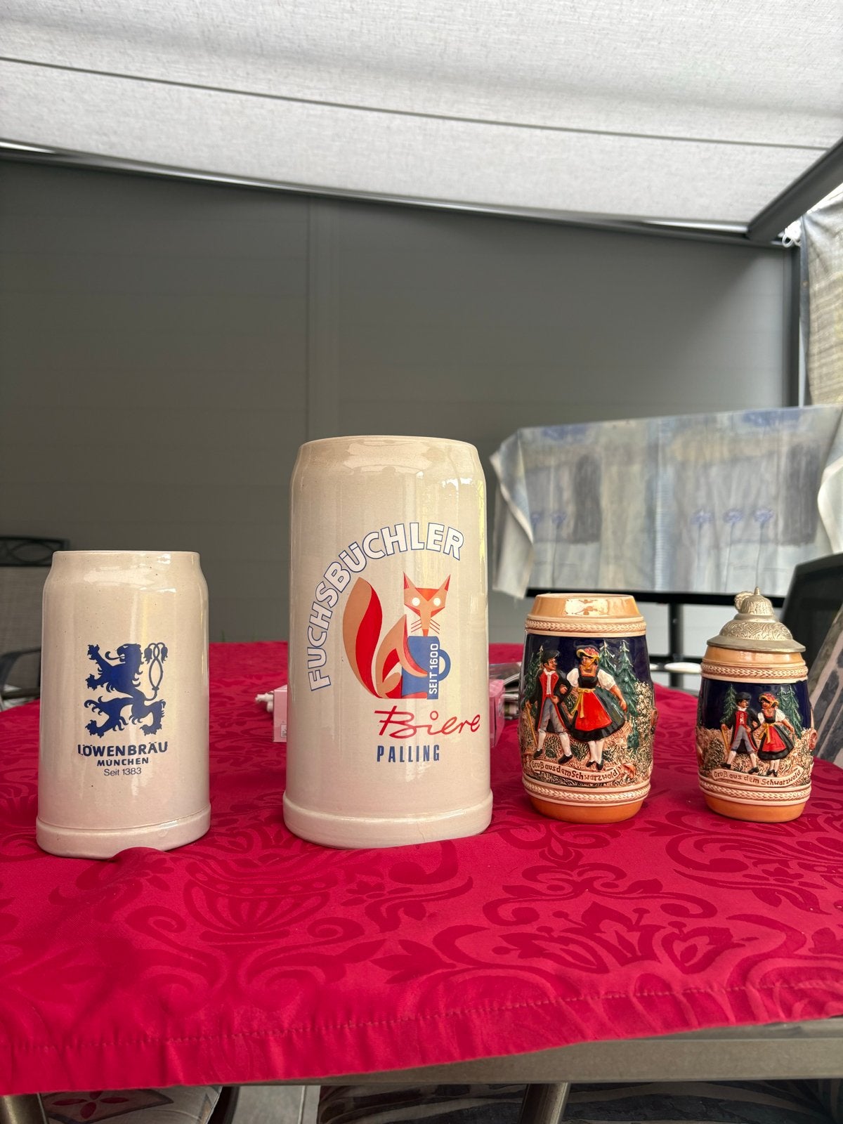 Set 4 Duitse bierpullen - Löwenbräu, Fuchsbichler en meer, Antiek en Kunst, Ophalen