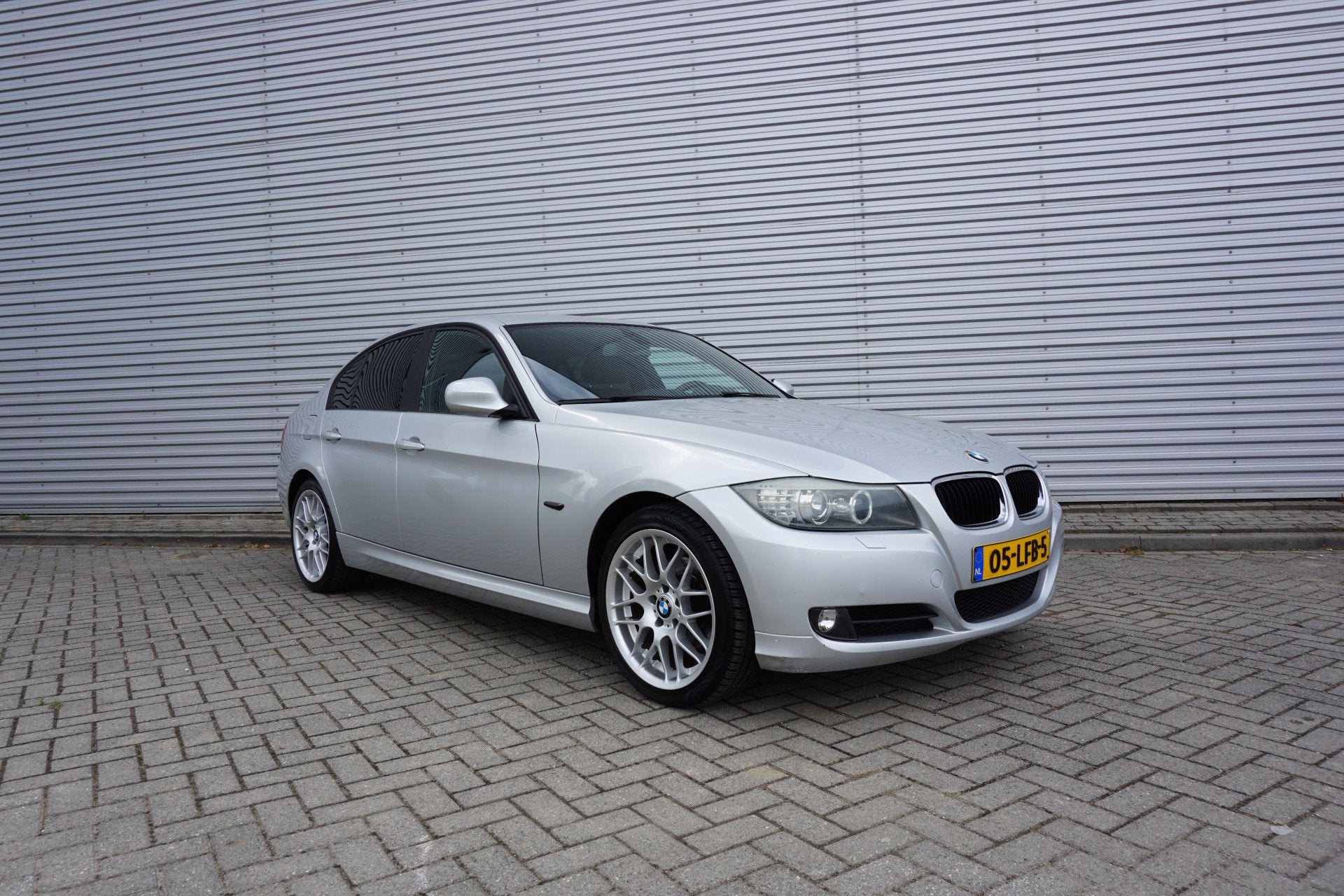 BMW 3-serie 316i Business Line Airco / Navi / Cruise / Carpl, Auto's, Euro 5, Gebruikt, 1599 cc, 4 cilinders