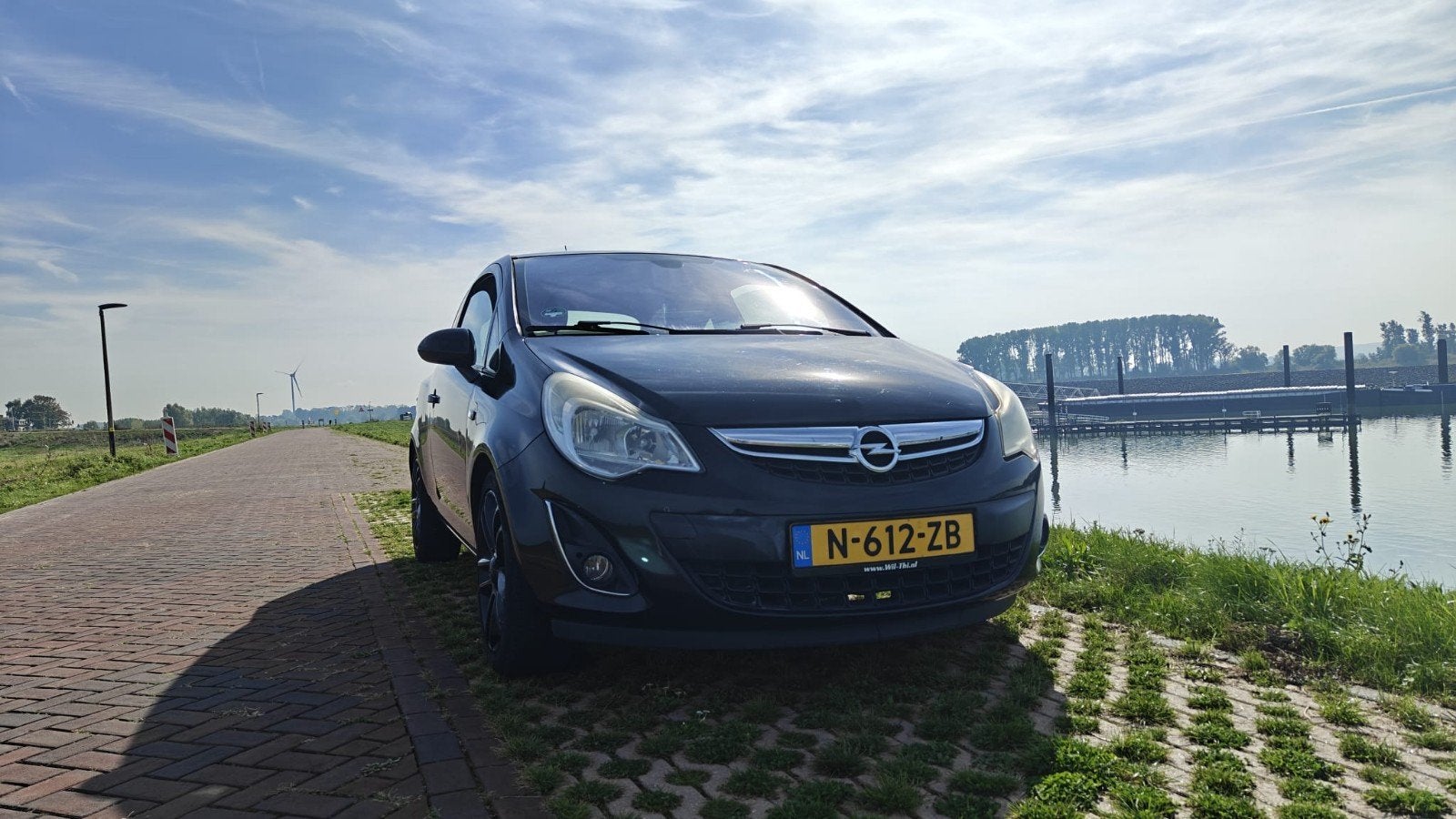 Opel Corsa 1.4 16V SD 2011 Zwart, Auto's, Voorwielaandrijving, 1398 cc, 4 cilinders, Handgeschakeld
