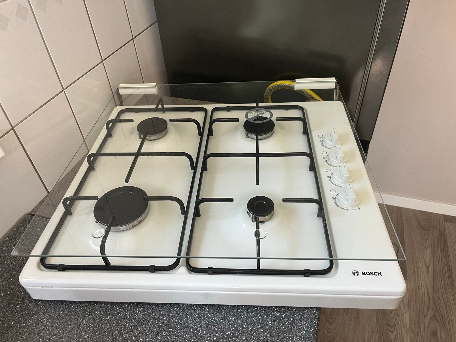 Bosch gasfornuis met 4 pitten en glazen afdekplaat, Ophalen, Gebruikt, Minder dan 85 cm, 60 cm of meer