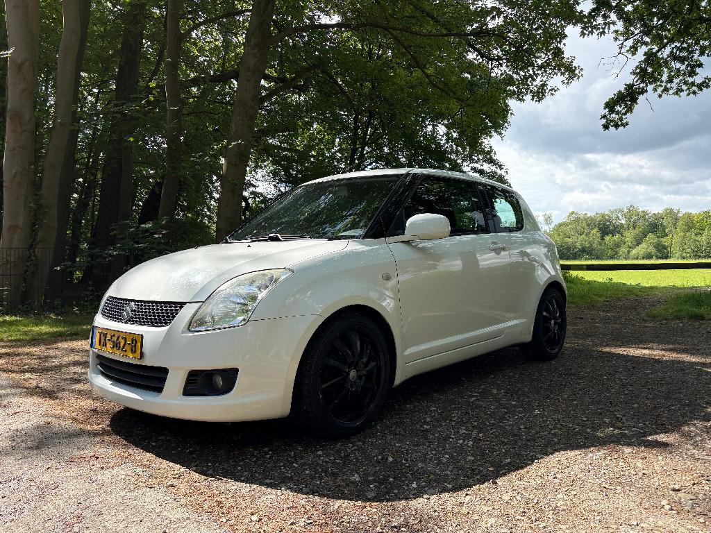 Suzuki Swift 1.3 3D 2009 Nw: Versnlbak + Kopp. | Stoelverw., Auto's, Stof, Handgeschakeld, 1000 kg, 17 km/l