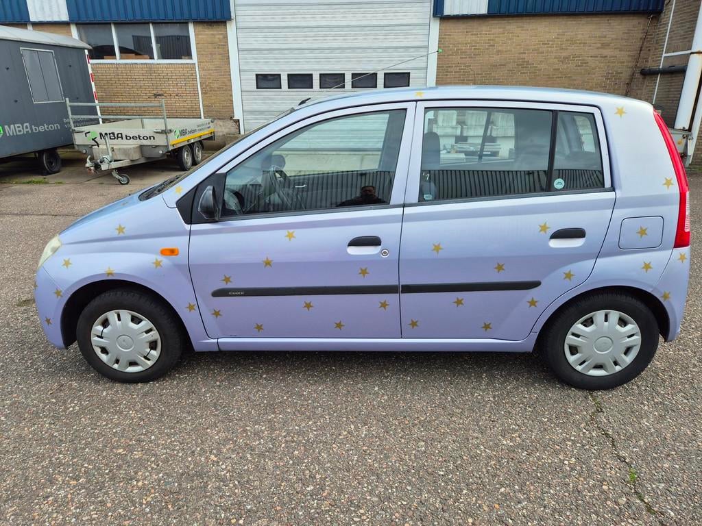 Daihatsu Cuore 1.0-12V Tokyo, nwe apk/ beurt gehad op 31-3-2, Auto's, Stof, Zwart, 4 stoelen, Cuore