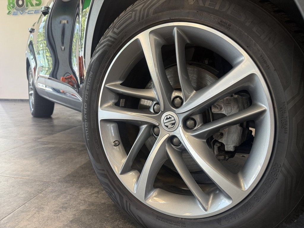MG EHS 1.5 TGDI Luxury Panoramadak Leder Trekhaak (bj 2022), Auto's, MG, Gebruikt, Overige brandstoffen, Zwart, Bedrijf
