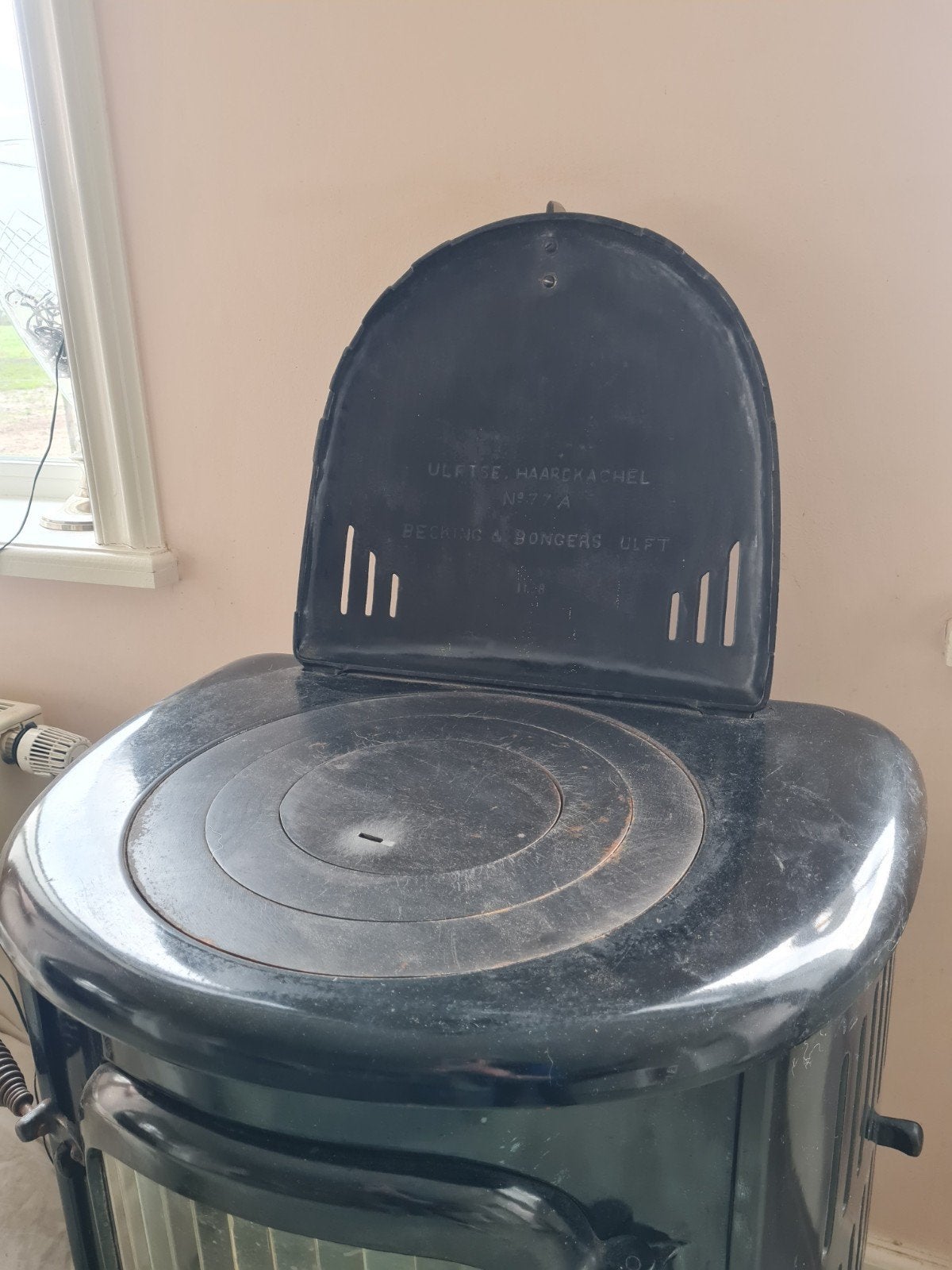 Te koop originele gietijzeren DRU kachel met nieuwe ruitjes, Ophalen, Hout, Houtkachel