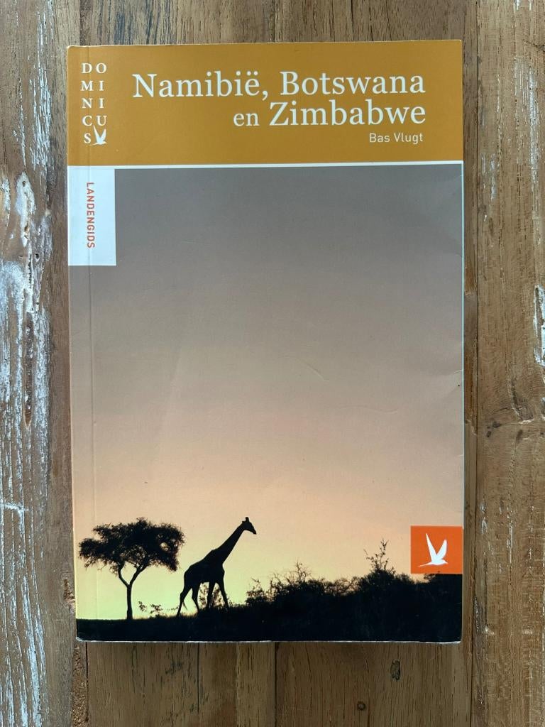 Dominicus - Namibië, Botswana en Zimbabwe, Afrika, Ophalen of Verzenden, Reisgids of -boek, Bas Vlugt
