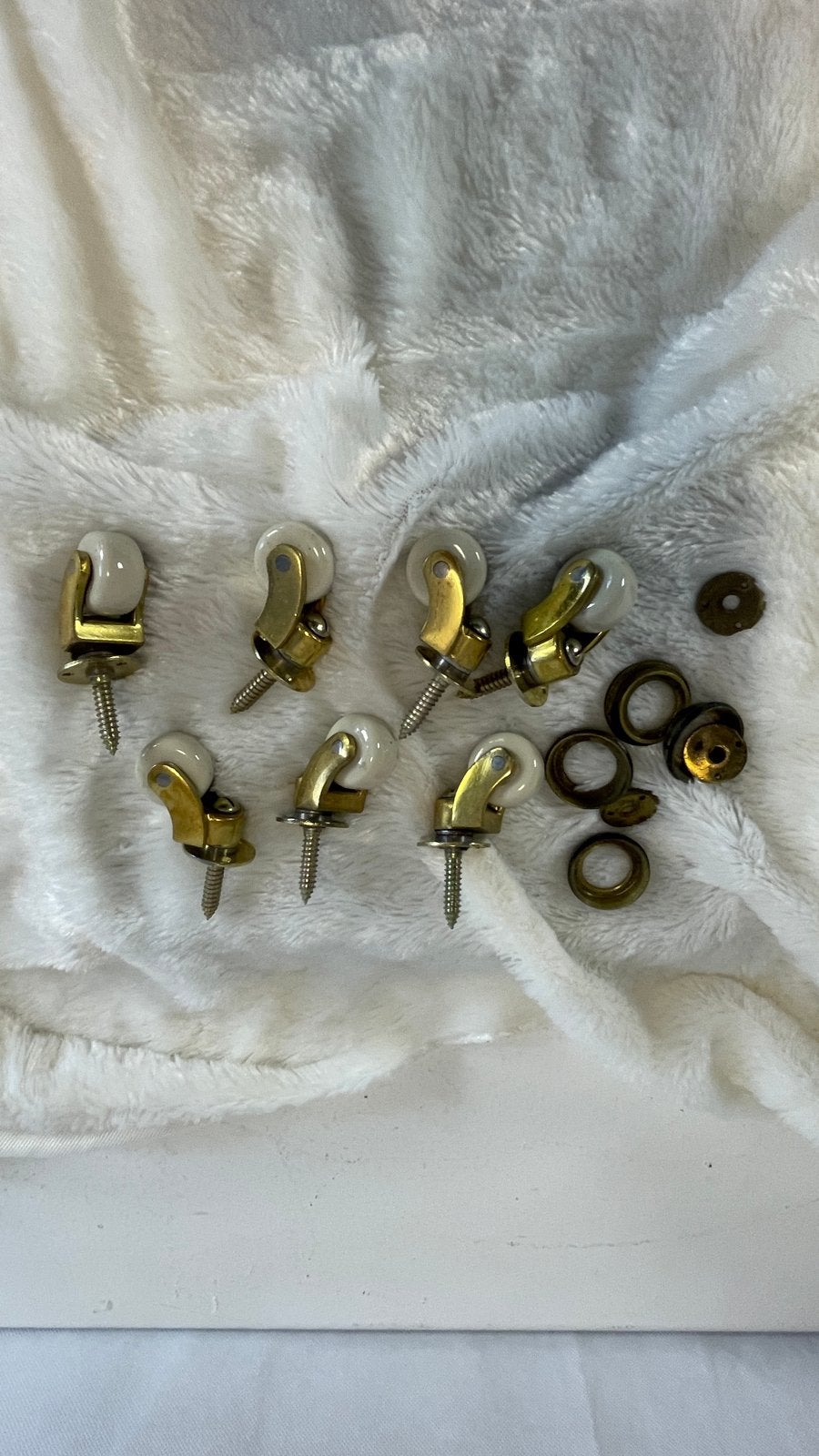 Set van 7 Vintage Messing Zwenkwielen met Porseleinen Wielen, Ophalen of Verzenden, Gebruikt