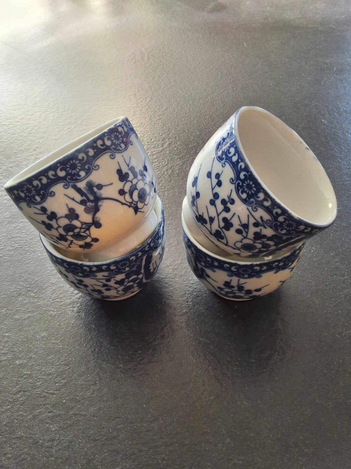 Set van 4 blauw-witte Chinese theekopjes, Ophalen