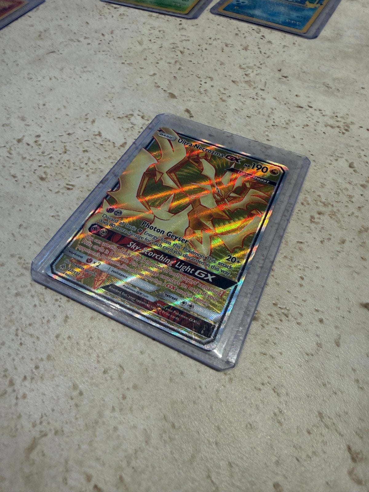 Ultra Necrozma GX 127/131 Pokémon Kaart, Ophalen of Verzenden, Zo goed als nieuw, Losse kaart, Foil