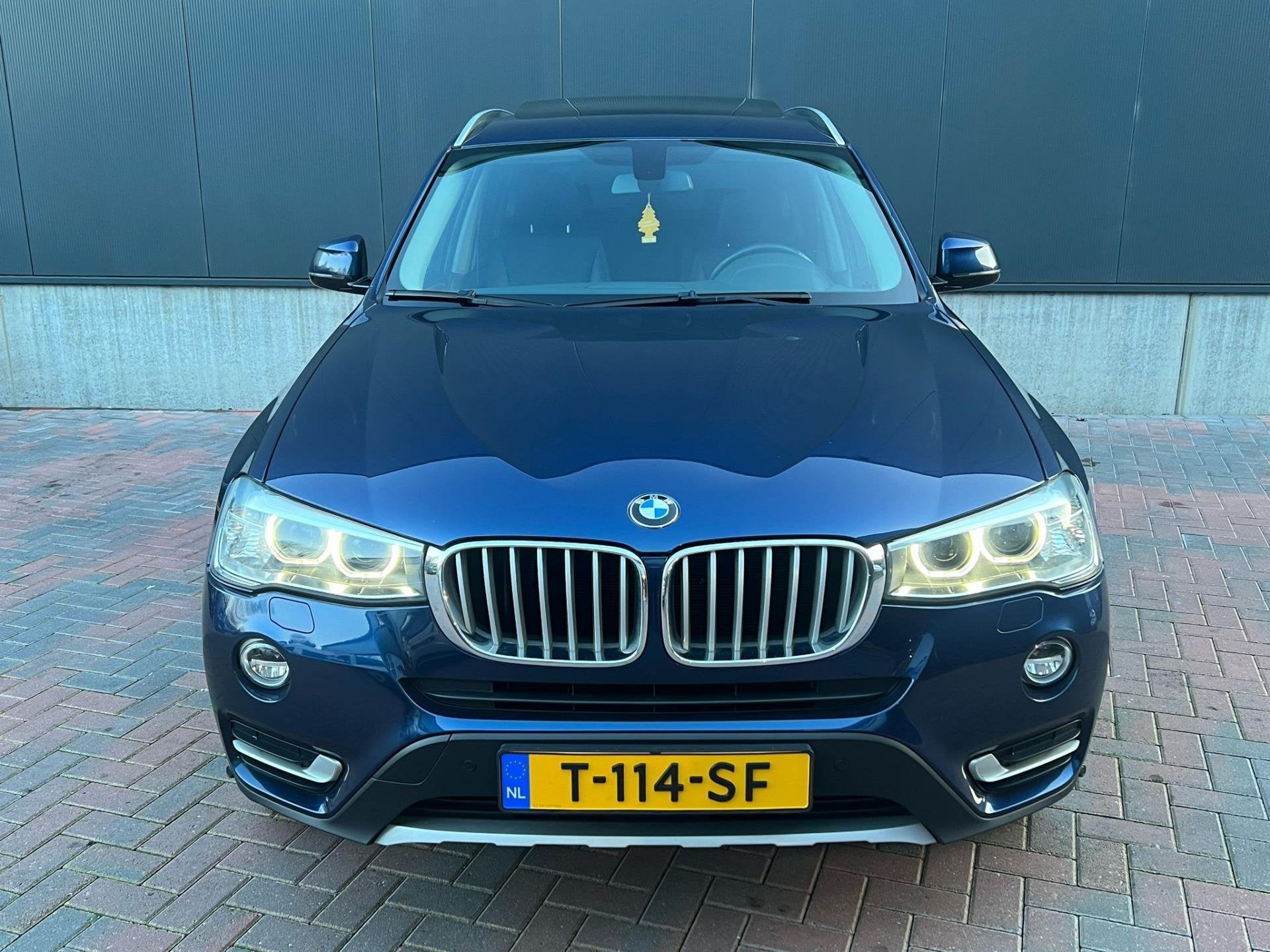 BMW X3 XDrive20d High executive X-Line * Aut * Navi * Cruise, Automaat, Zwart, Blauw, Leder en Stof