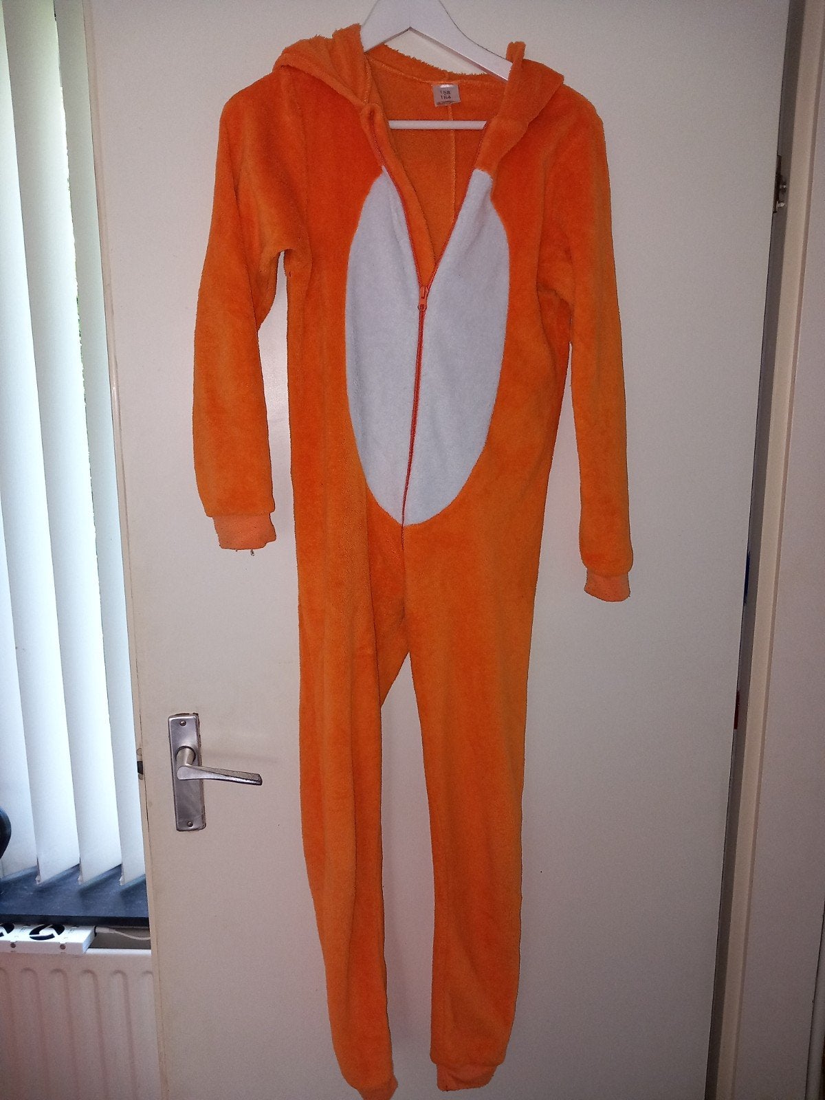Onesie oranje LEEUW maat 158/164, Ophalen of Verzenden, Zo goed als nieuw, Jongen of Meisje