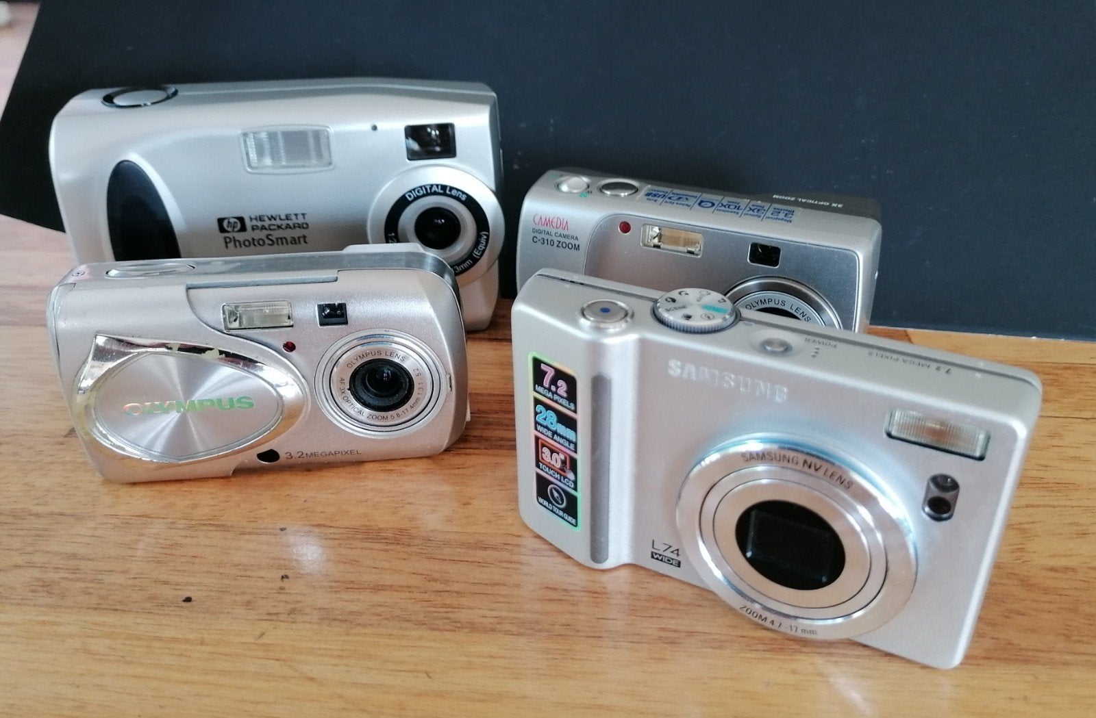 Partij van 4 compactcamera's: HP, Olympus, Samsung, Camedia, Ingebouwde flitser, Gebruikt, Ophalen of Verzenden, Compactcamera