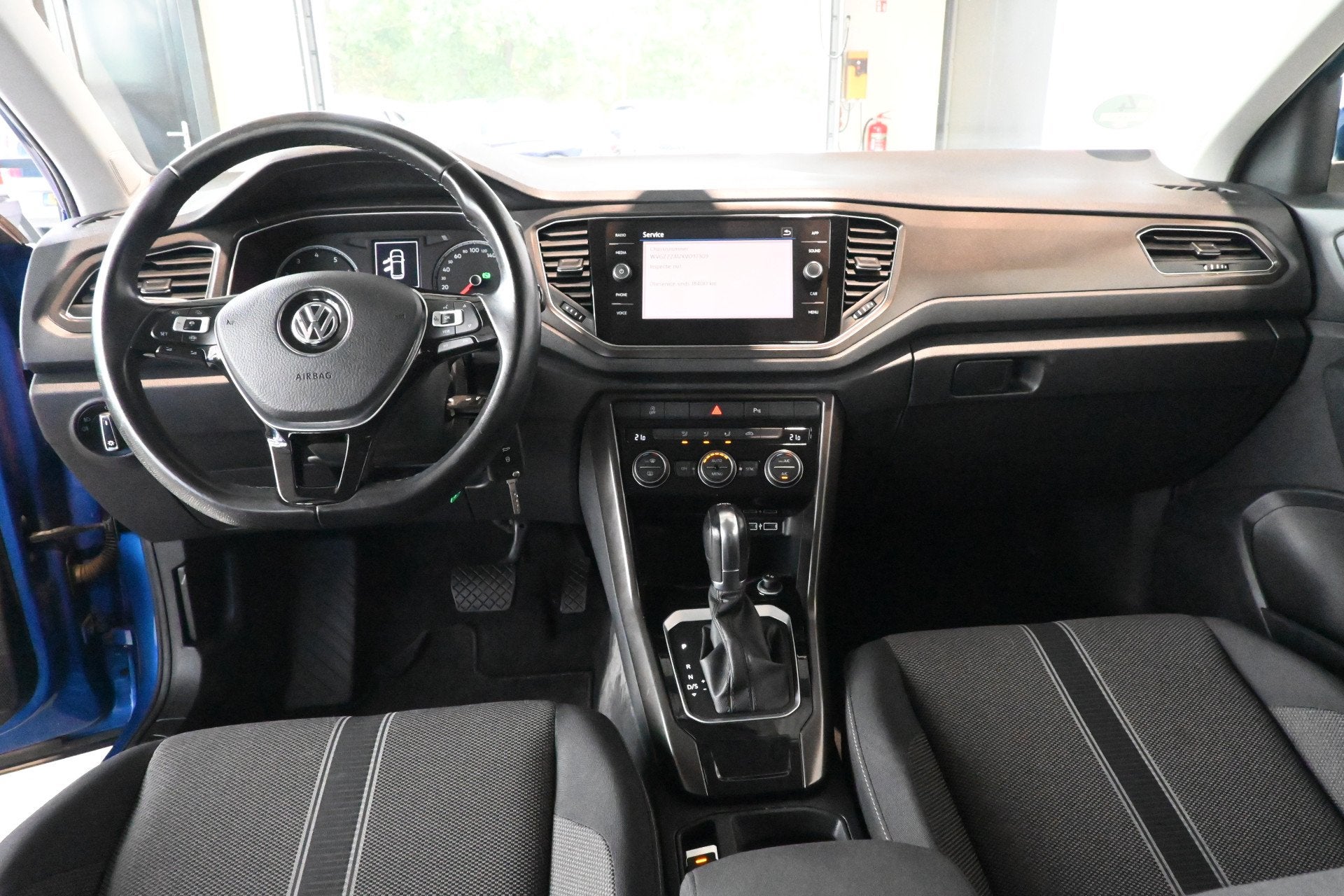 Volkswagen T-Roc 1.5 TSI Style Automaat Clima Carplay Cruise, Auto's, Stof, 4 cilinders, Blauw, Origineel Nederlands