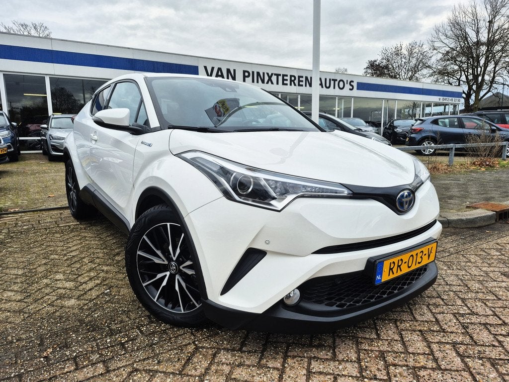 Toyota C-HR 1.8 Hybrid Dynamic (NEDERLANDSE AUTO 1e EIGENAAR, Auto's, 12 maanden, Euro 6, 4 cilinders, Wit
