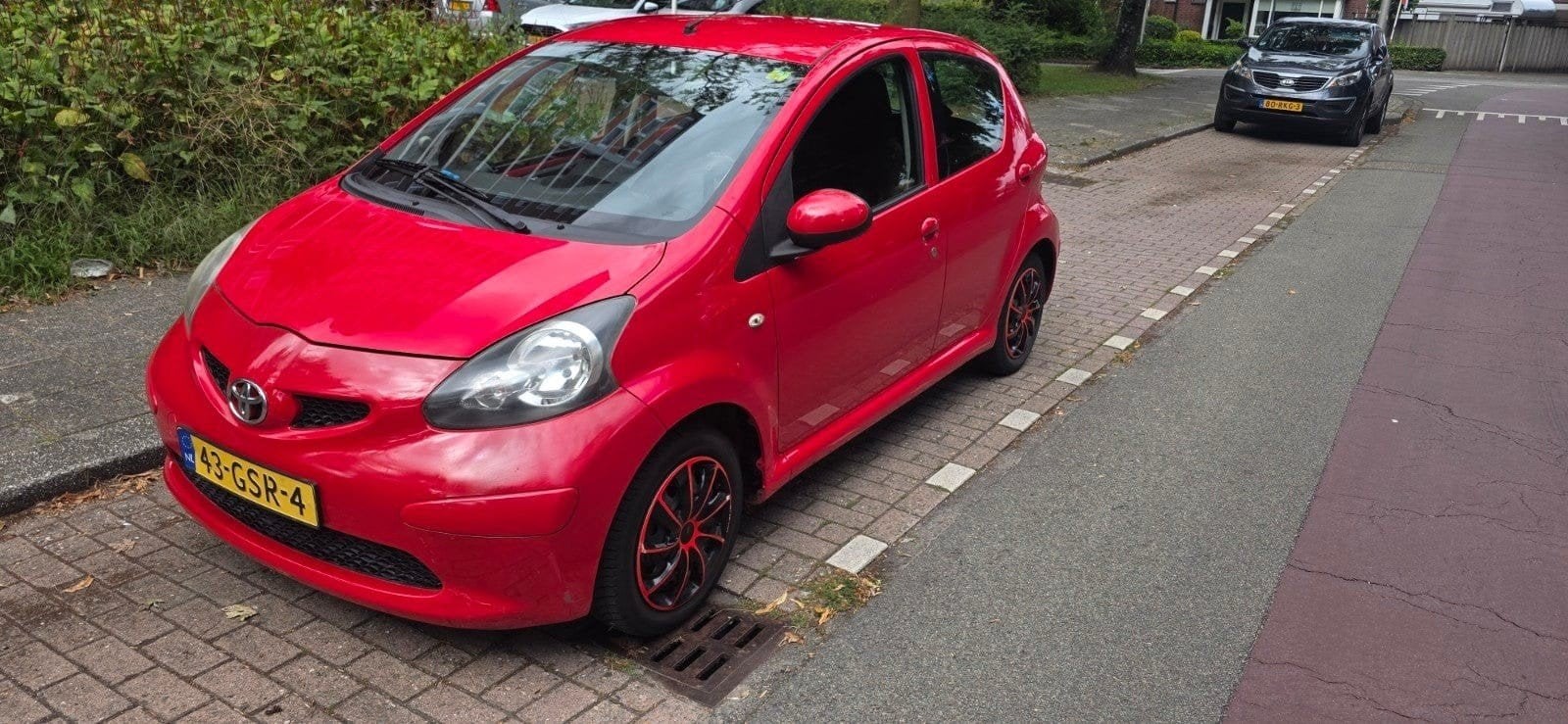 Toyota Aygo 1.0 12V Vvt-i 5DRS 2008 Rood, Auto's, Voorwielaandrijving, Stof, 4 stoelen, 68 pk