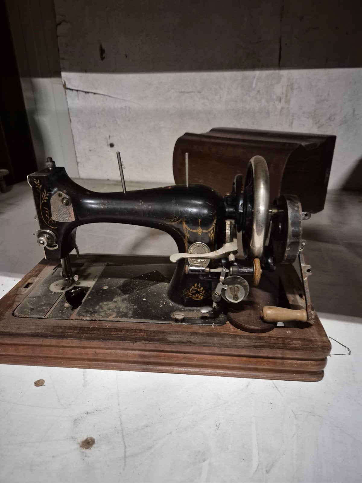 antieke naaimachine, Ophalen