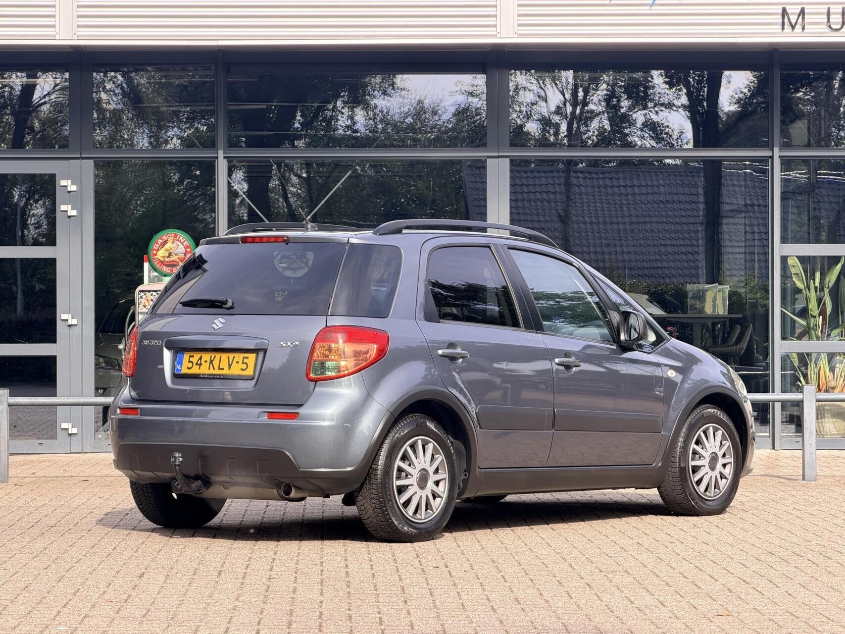 Suzuki SX4 1.6 Shogun | Airco | Trekhaak | 5DRS | Centrale D, Gebruikt, Zwart, 4 cilinders, 49 €/maand