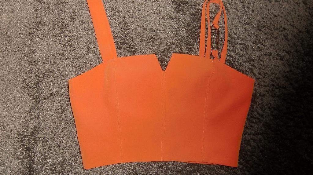 Korte top  Nikkie  maat 34, Oranje, Ophalen of Verzenden, Zo goed als nieuw, Nikkie