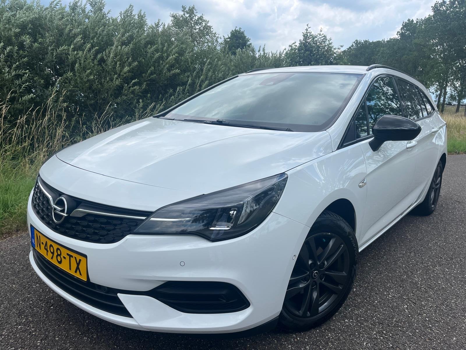 Opel Astra Sports Tourer 1.2 | Clima | Cruise | Navi | Bluet, Voorwielaandrijving, Gebruikt, Euro 6, 1199 cc