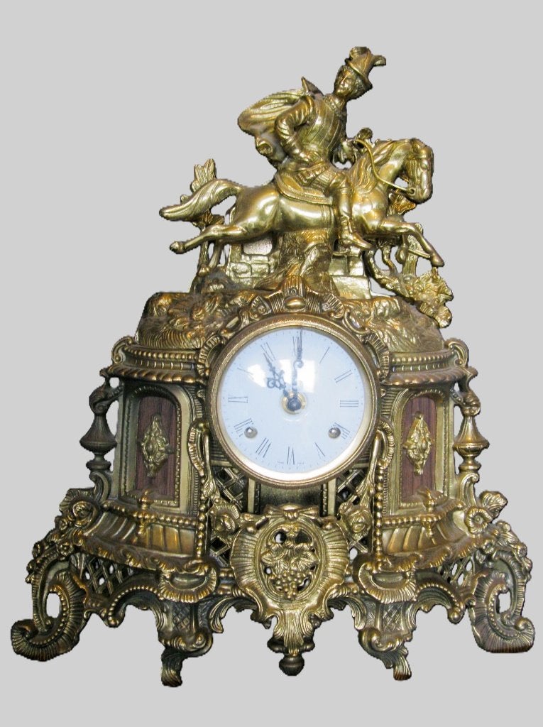 Bronzen pendule (uitbeelding ruiter te paard)., Ophalen