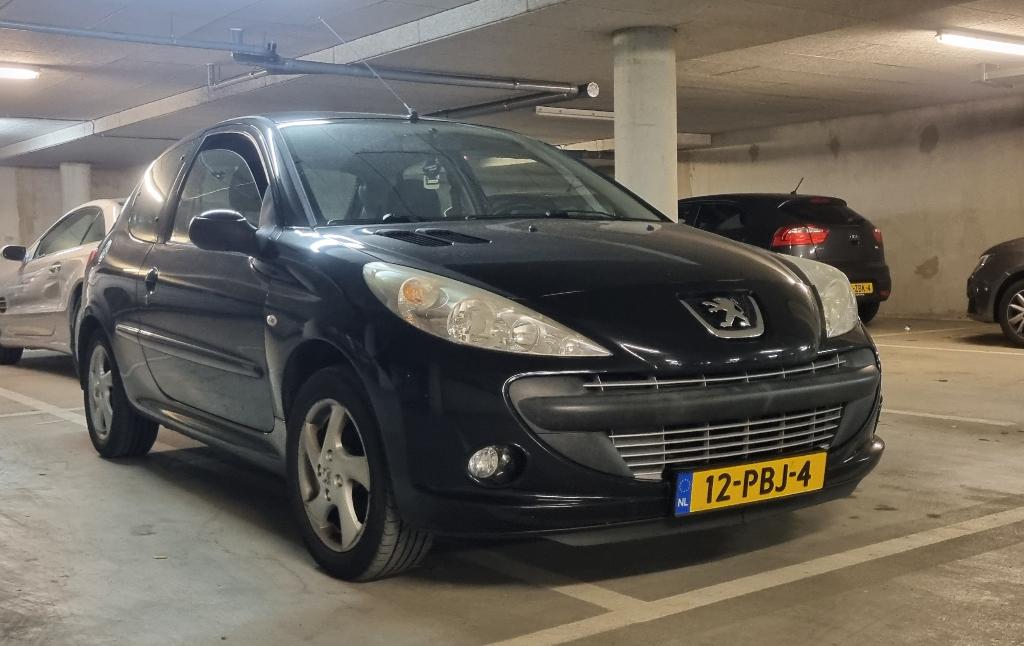 Peugeot 206+ 1.4 2011 Zwart NAP, Voorwielaandrijving, 206+, Stof, 1360 cc