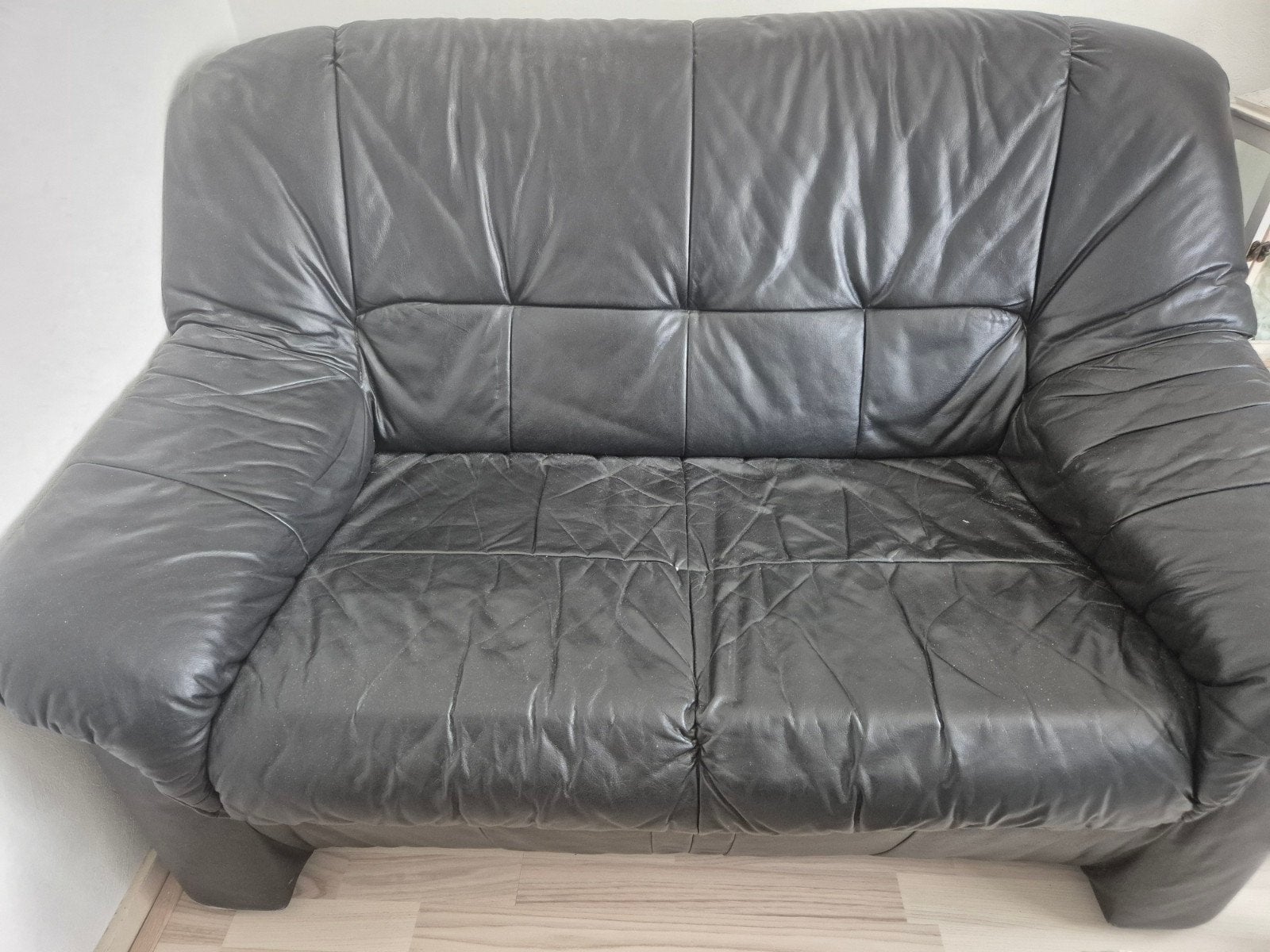 Comfortabele zwarte leren tweezitsbank, Gebruikt, 150 tot 200 cm, Tweepersoons, Ophalen of Verzenden
