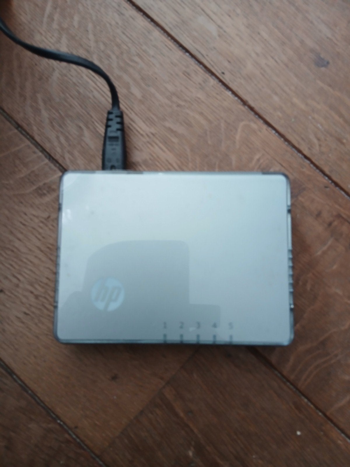 HP V1405-5 Switch (3CFSU05) - 5-poorts netwerkswitch, Computers en Software, Netwerk switches, Ophalen of Verzenden, Gebruikt