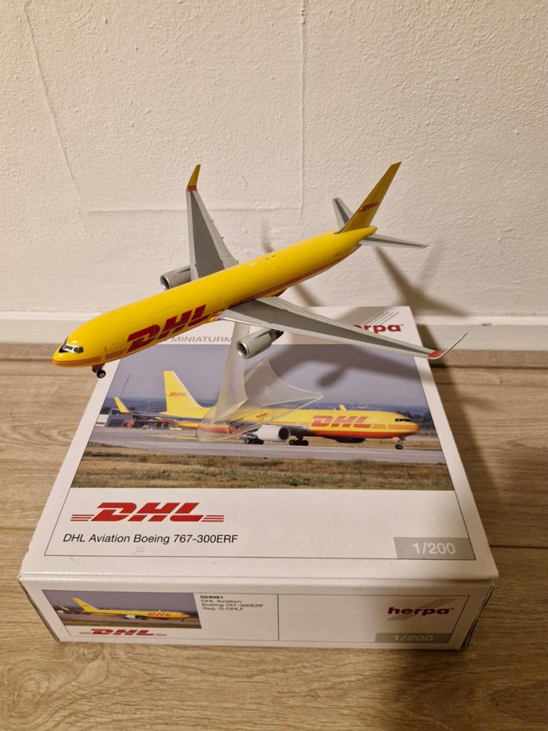 Schaalmodel Herpa 767-300ERF DHL 1/200, Verzamelen, Luchtvaart en Vliegtuigspotten, Ophalen of Verzenden, Schaalmodel