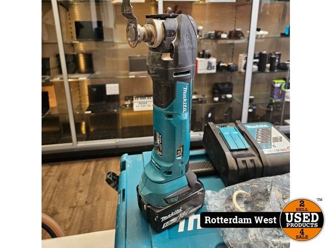 Makita DTM51 Multitool + Accu en Lader, Makita, Zo goed als nieuw, Support@makita.com, Makita Corporation, 3-11-8, Sumiyoshi-cho, 
Anjo, Aichi 446-8502
Japan