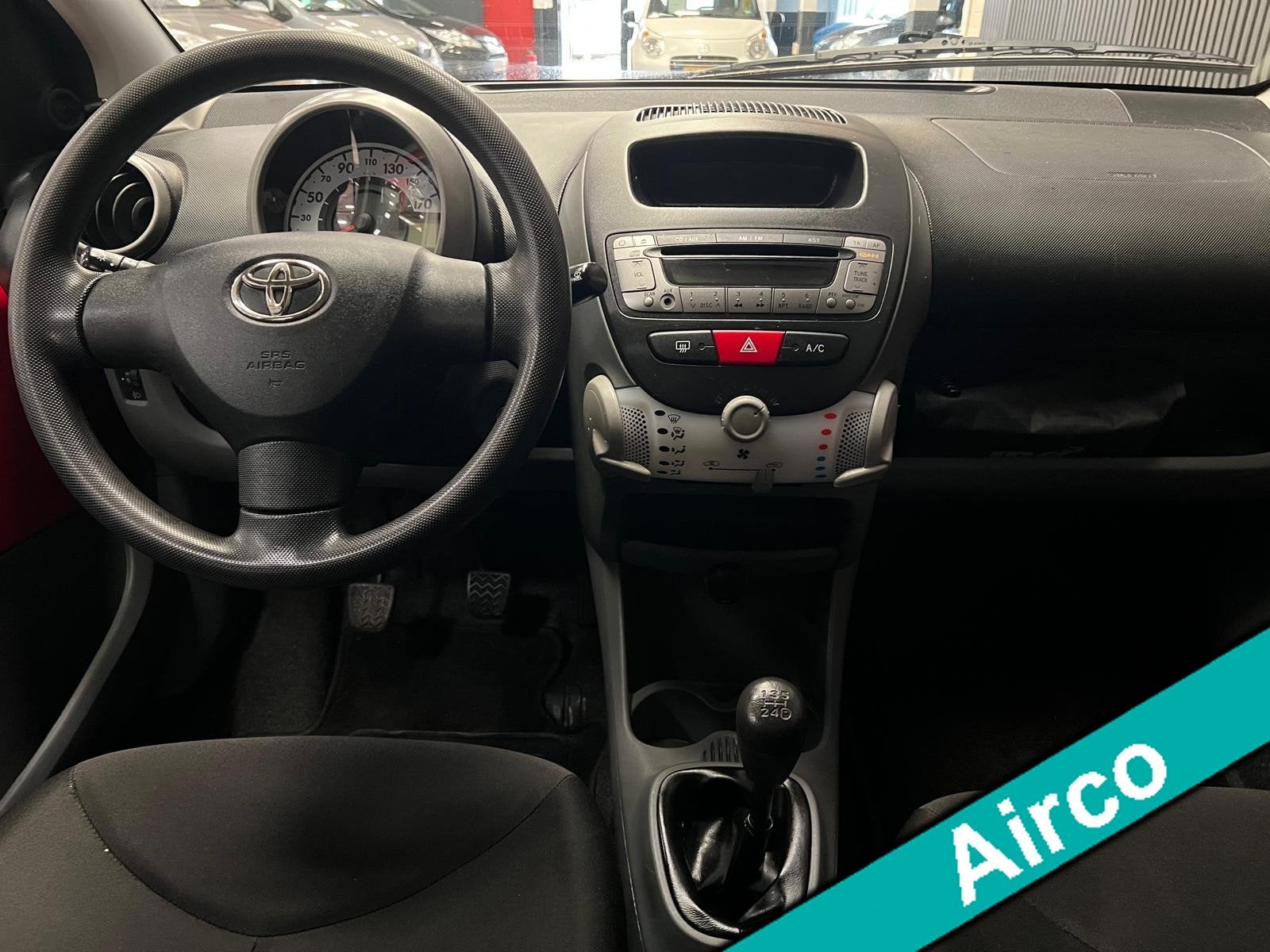 Toyota Aygo 1.0-12V Now 1e Eigenaar - NAP - Elektr. Raam, Auto's, Voorwielaandrijving, Euro 5, Stof, Gebruikt