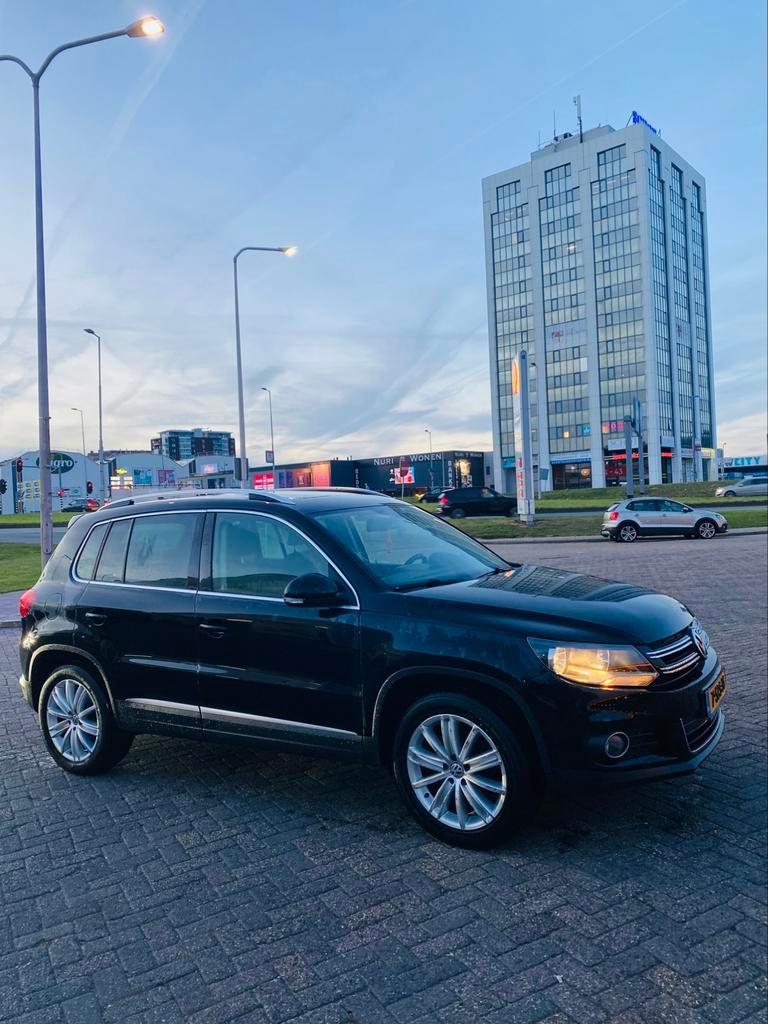 Volkswagen Tiguan 2.0 TSI 132KW/180PK 4M 7-DSG 2013 Zwart, Auto's, Volkswagen, Automaat, 4 cilinders, 1984 cc, 179 pk